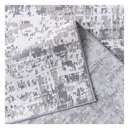 Folded Clouds Area Rug and its backing  