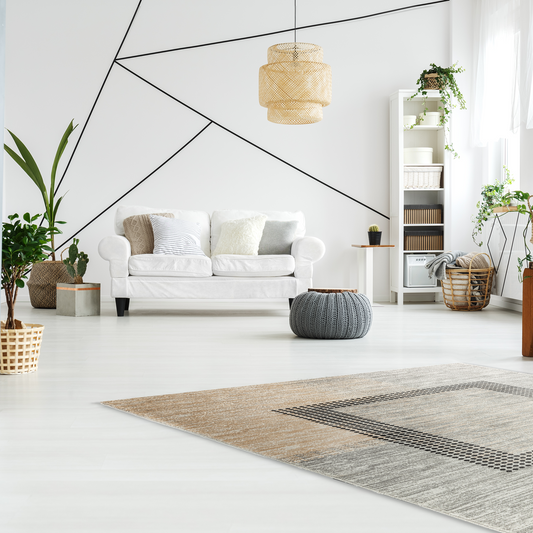 Bright scandinavian living room with white walls, floor, sofa and bookcase featuring Istanbul Square Rug in neutral colour palette of beige, black and grey  